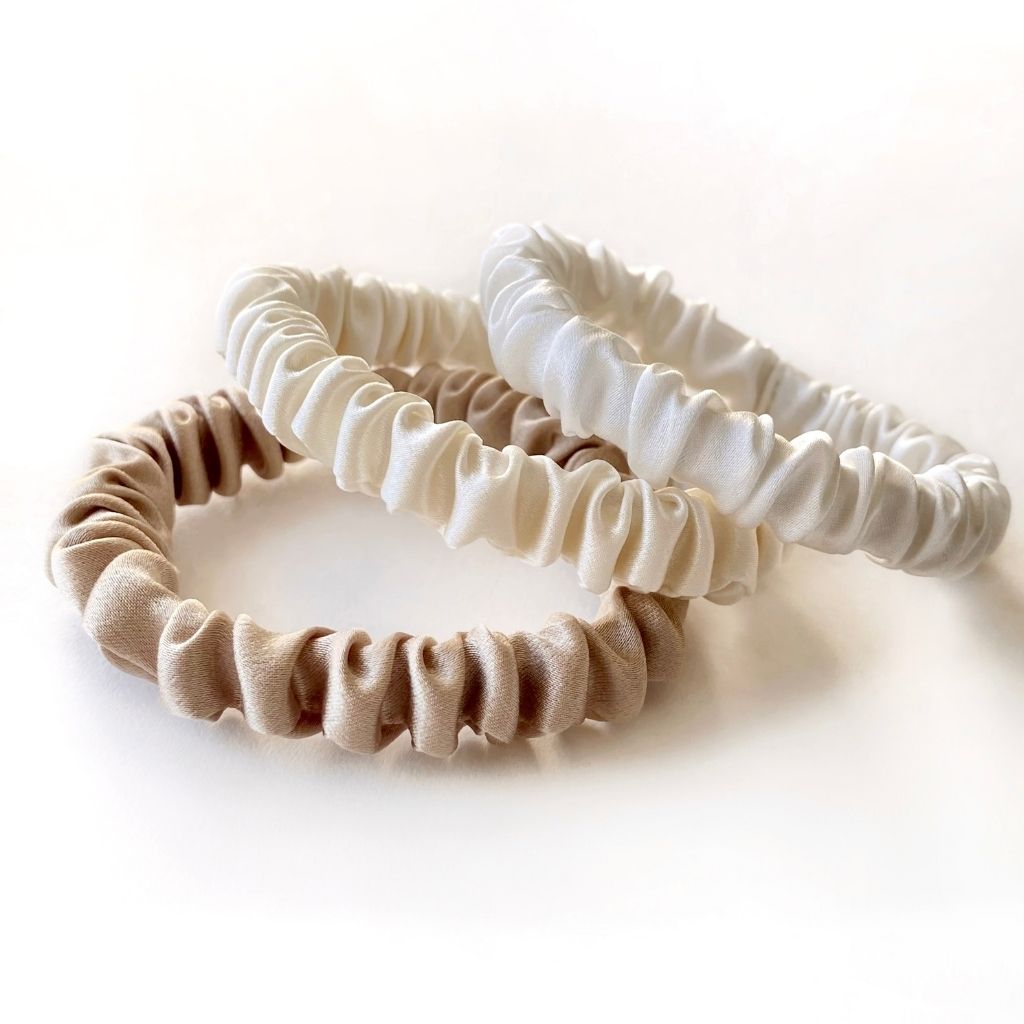 River Minami wedding-focused stack of white, champagne beige, and neutral mulberry silk skinny scrunchies hair ties.