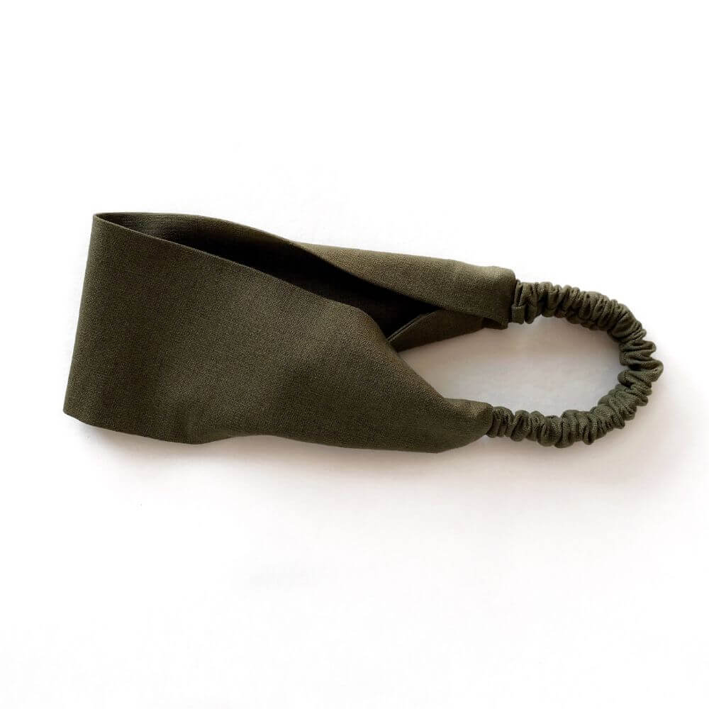 olive green linen headband on a white background
