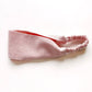 Pink linen headband on a white background