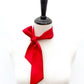 red mulberry silk satin skinny scarf tied around mannequin's neck