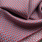 Close-up of a deep red small geometric and paisley print mulberry silk square scarf