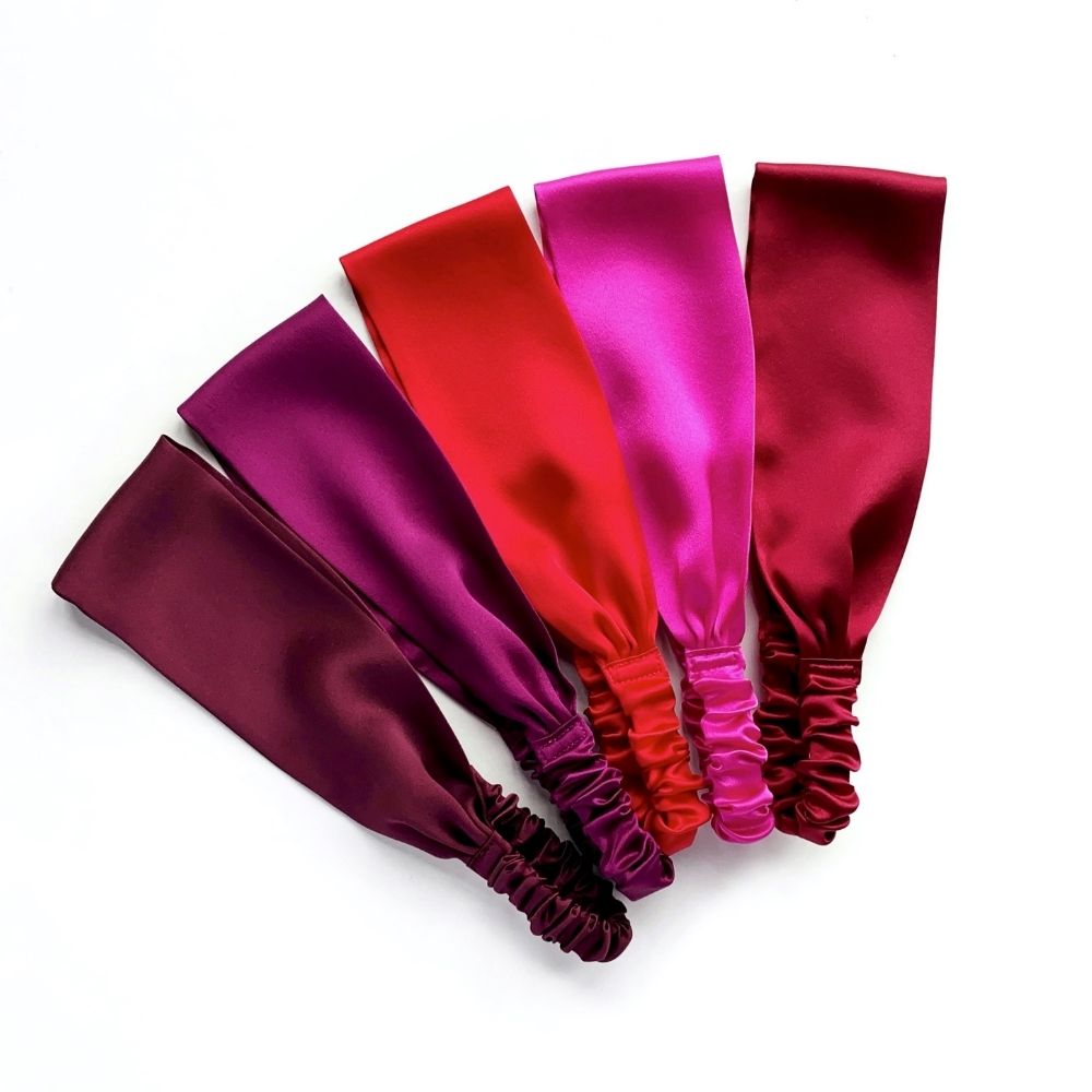 Handmade mulberry silk headbands in fuchsia, red, burgundy and purple by River Minami.