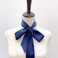 navy blue mulberry silk satin skinny scarf tied around mannequin's neck