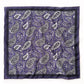Flat lay of the purple paisley silk cotton blend square scarf, displaying the full detailed print and contrast border.