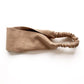 Taupe brown linen headband on a white background