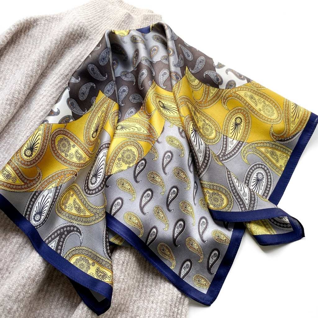 yellow grey silver paisley print mulberry silk square scarf displayed on the white background